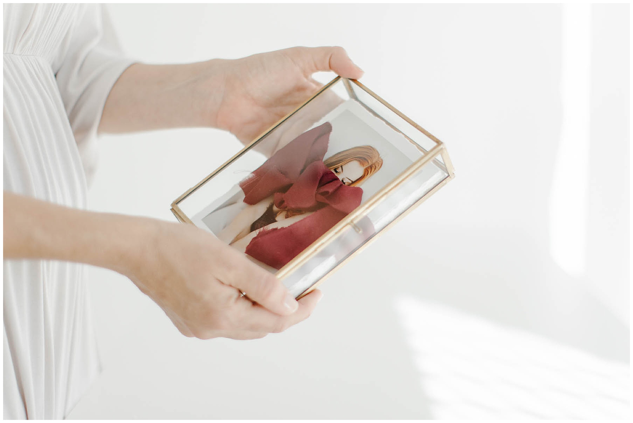 Vintage glass box with prints from boudoir session